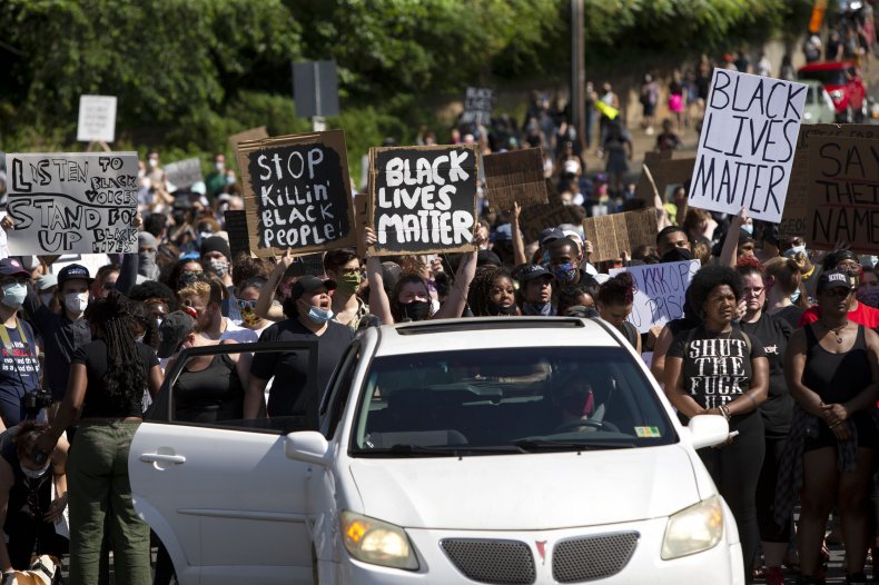 People march during a racial justice protest