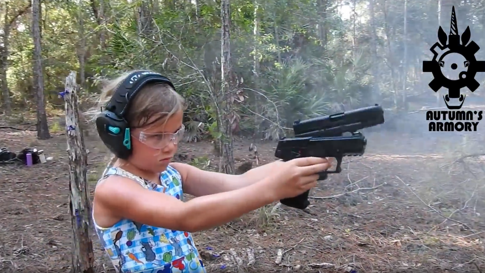girls firing guns Video of Little Girl Dual-Wielding Guns Viewed Over 2 Million Times -  Newsweek