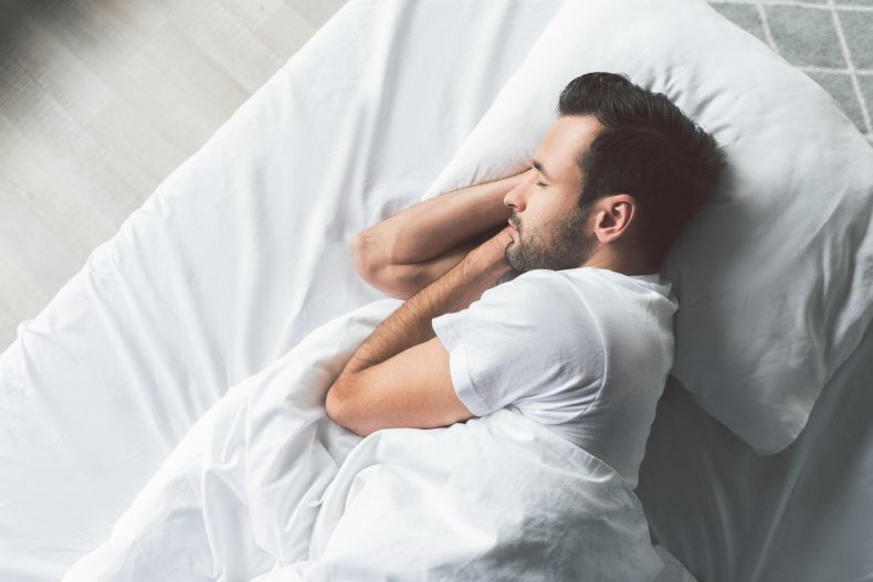 A man sleeping peacefully.