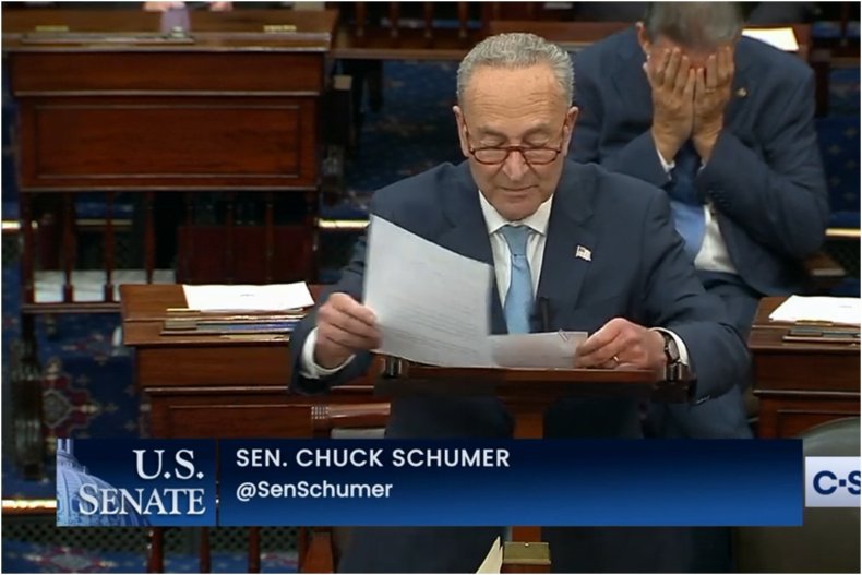 Manchin Holds His Head While Schumer Speaks
