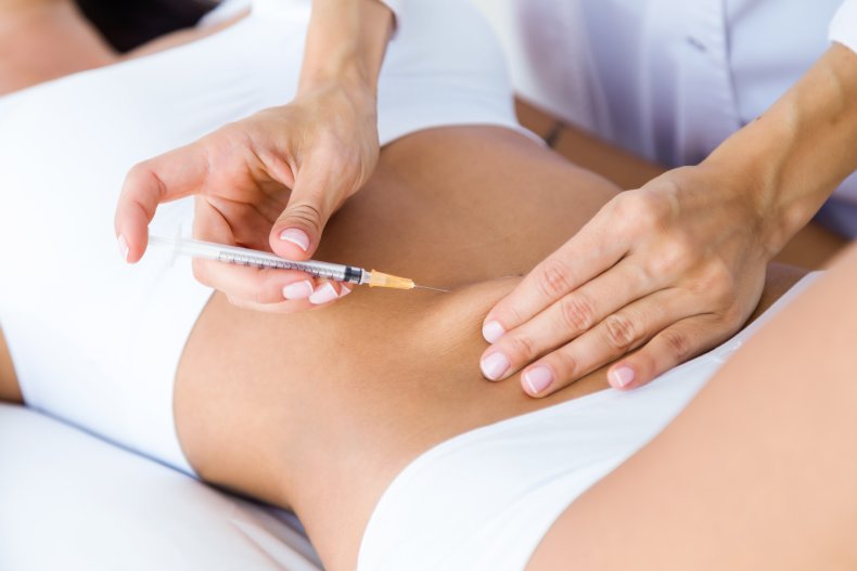 A woman undergoing a cosmetic procedure