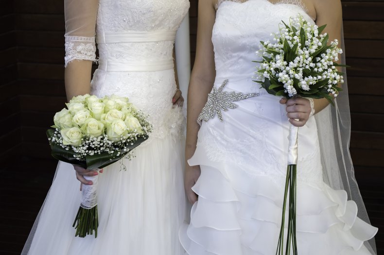 File photo of women in wedding dresses.
