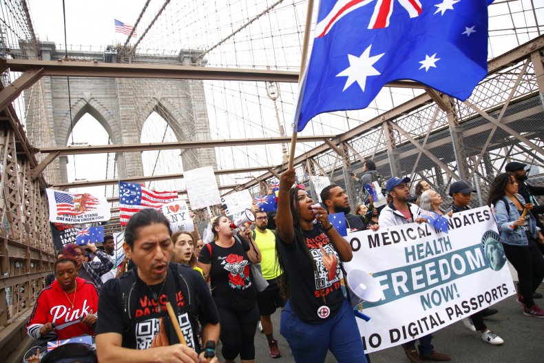 People march in protest of vaccine mandate