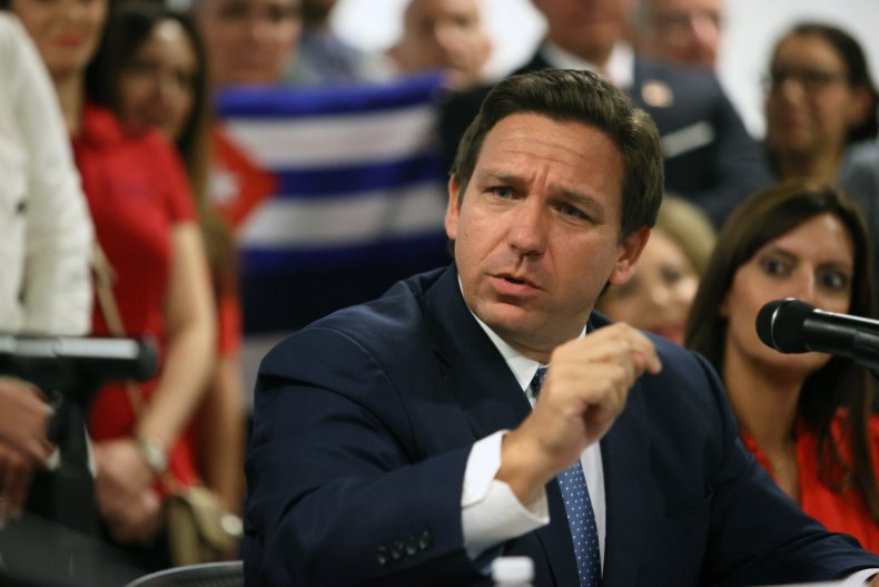 ron desantis vaccine firing county fined