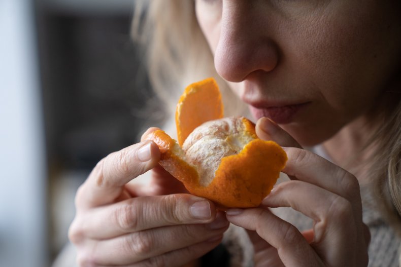 Woman smelling food