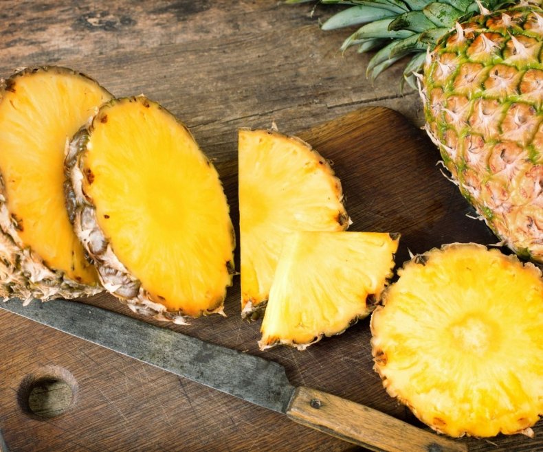 Pineapple chopping on a board