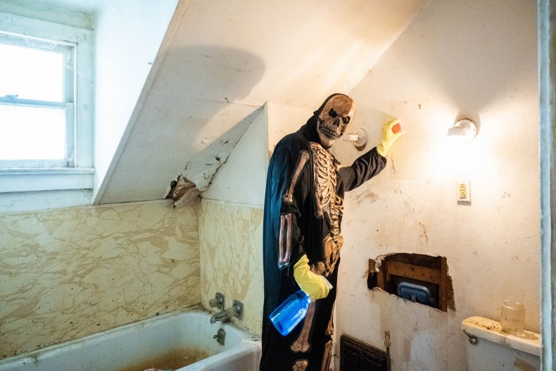 Skeleton cleaning bathroom