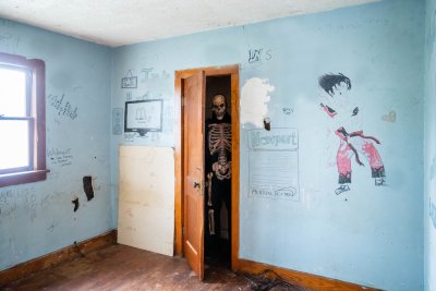 Skeleton in doorway