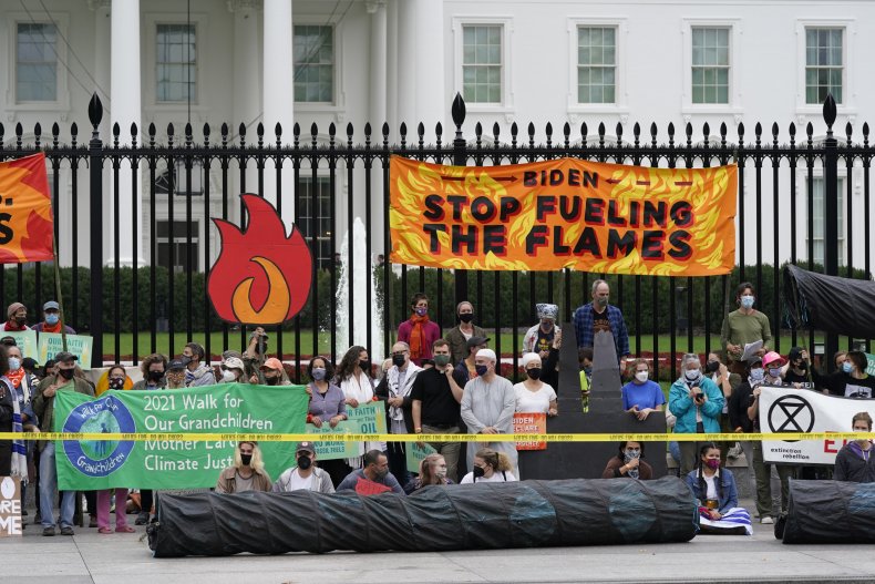 Over 100 Arrested During Climate Protest at Interior
Department, Some Reportedly Tased 2 Climate Activists Protest