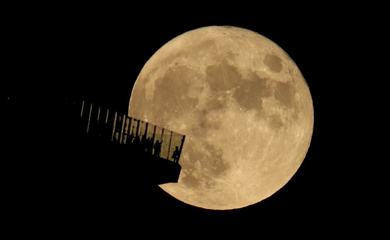 The Full Hunter's Moon Rises Behind EdgeNYC 