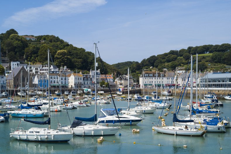 Boats moored in a Jersey harbor.