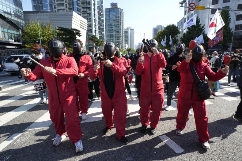 squid game costume protesters in south korea