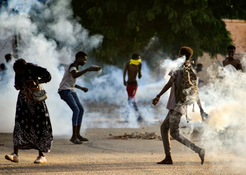 Sudanese youths confront security forces amidst tear