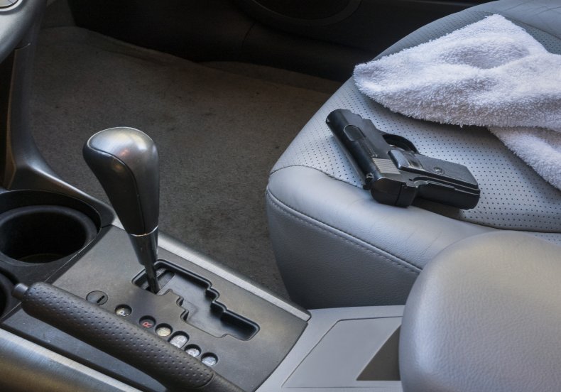 Stock photo gun on car seat