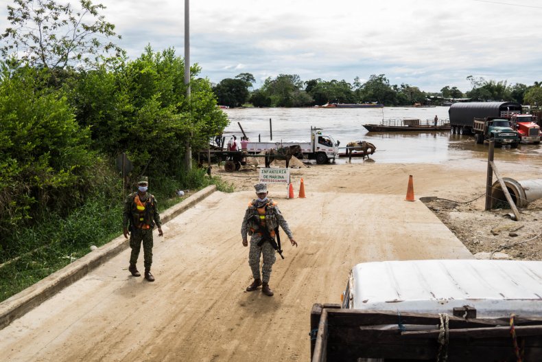 A military checkpoint near a river crossing