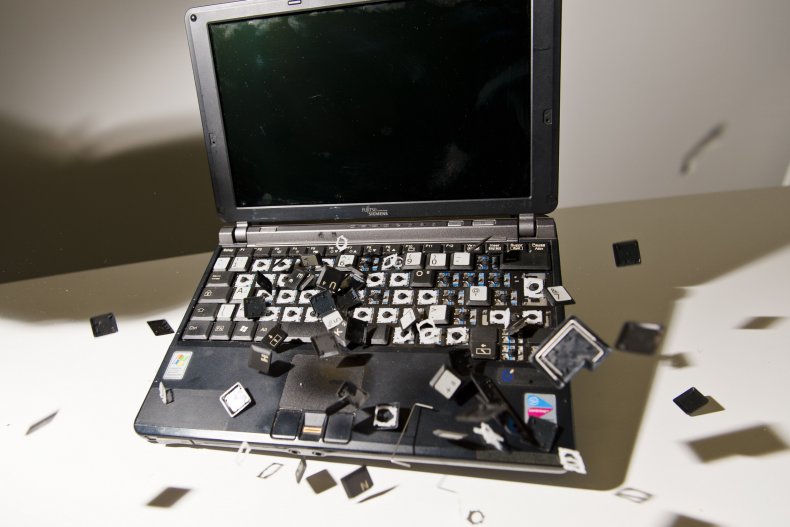 A broken laptop on a table