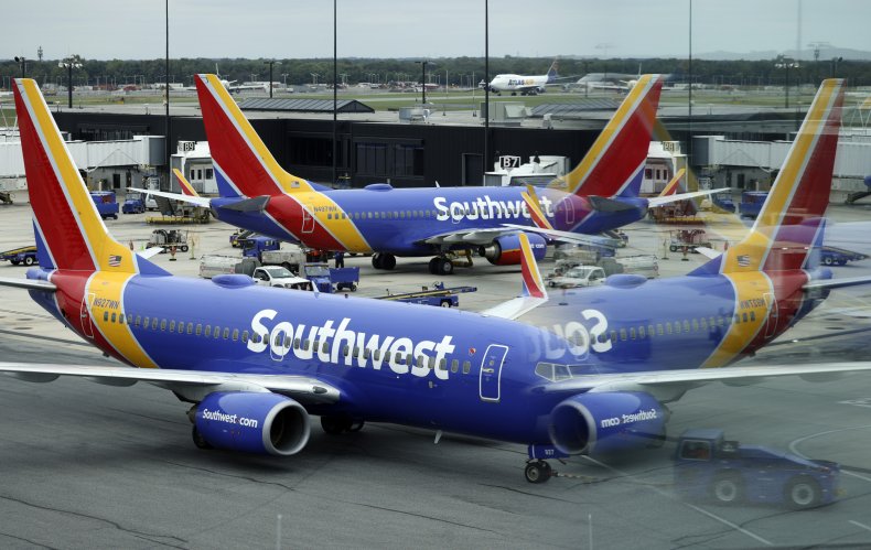 A Southwest Airlines airplane taxies from gate