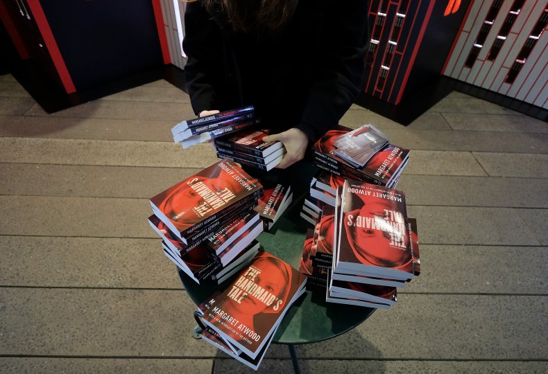 Organizers arrange copies of Margaret Atwood's book 