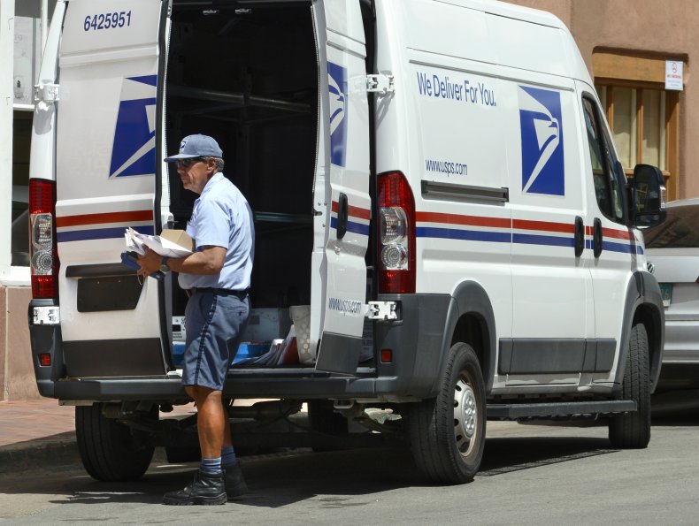 U.S. postman delivers mail