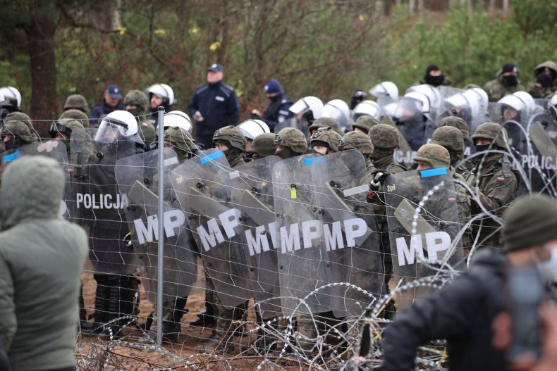 Poland police on Belarus border with migrants