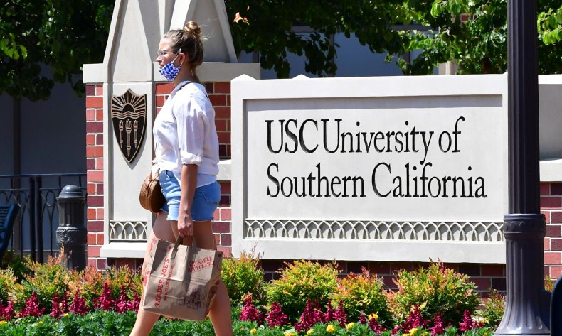 Woman walks past University of Southern California