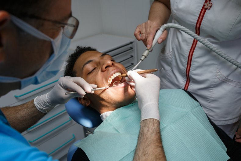 A man in a dentist's chair.