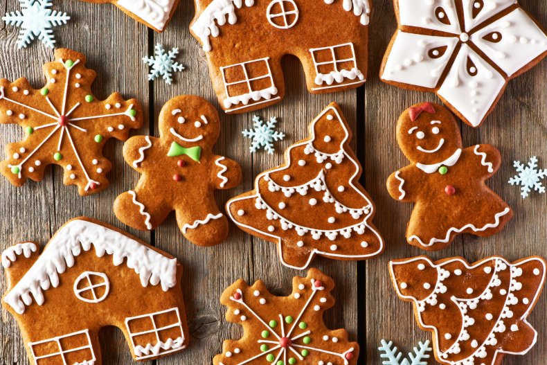 Christmas-themed gingerbread cookies on a table.