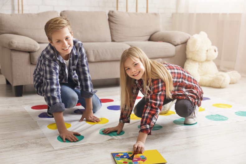 Kids playing a game of Twister.