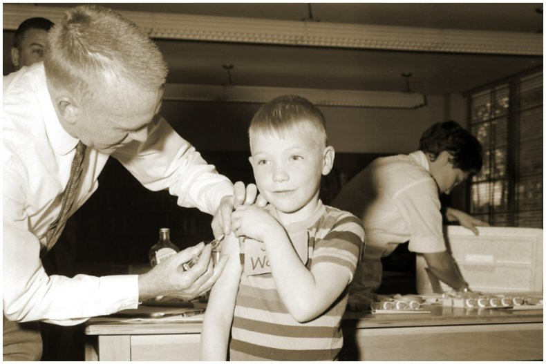 Boy receiving measles vaccine in 1962.