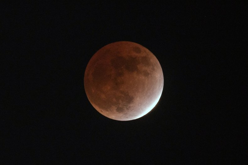 Partial lunar eclipse above Tokyo, Japan