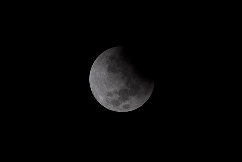Partial lunar eclipse above San Salvador