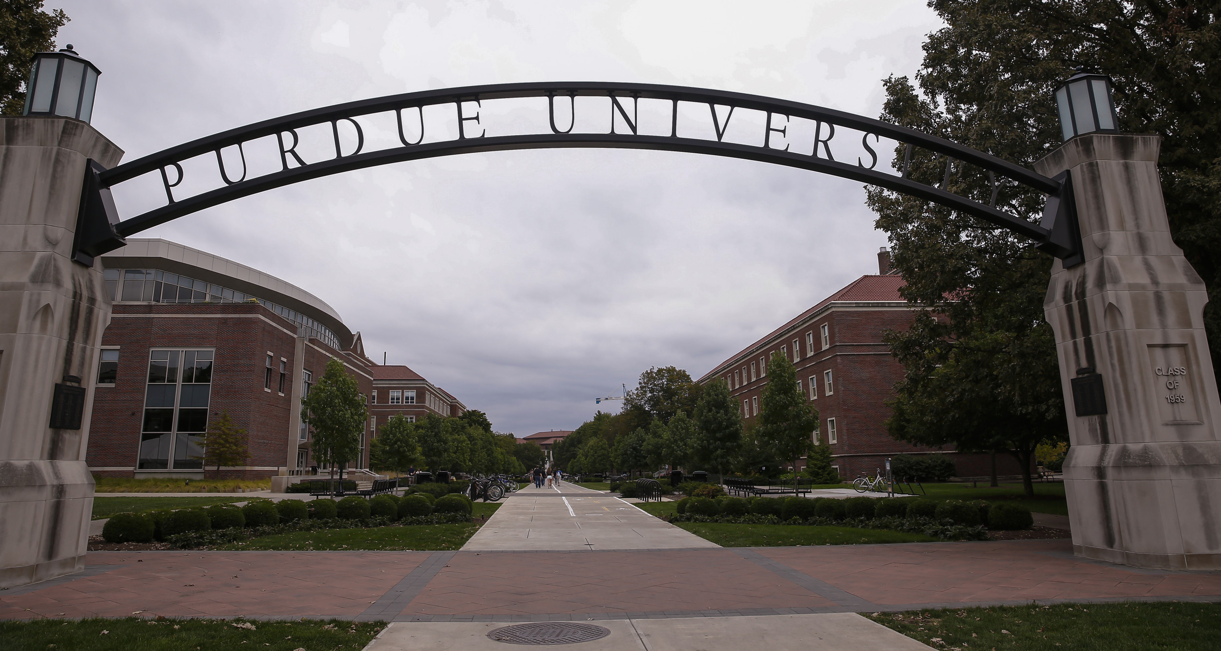 Purdue Professor Accused of Locking Son in Crate, Hitting Wife With