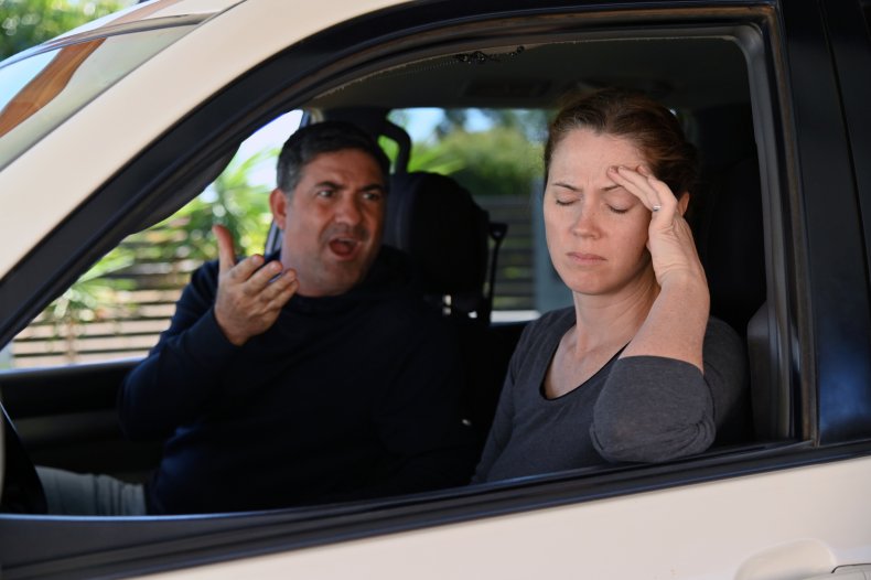 A man and woman in a car.
