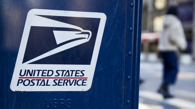A USPS logo on an NYC mailbox.