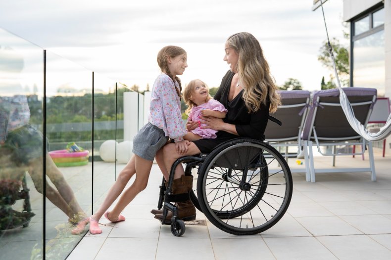 Wheelchair Racer Carmen Gimenez With Her Daughters