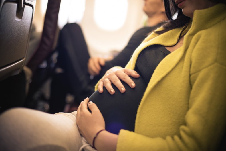 Pregnant woman on plane