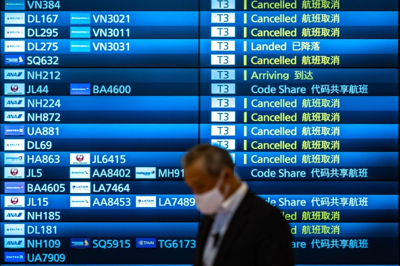 Cancelled flights board at Tokyo's Haneda airport.