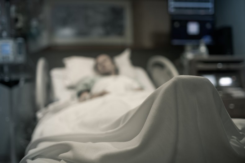 Woman Hospital Bed