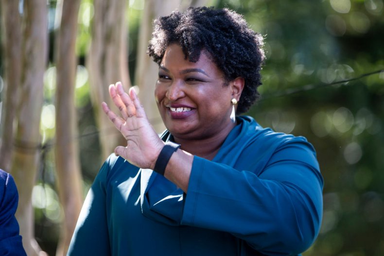 Stacey Abrams waves