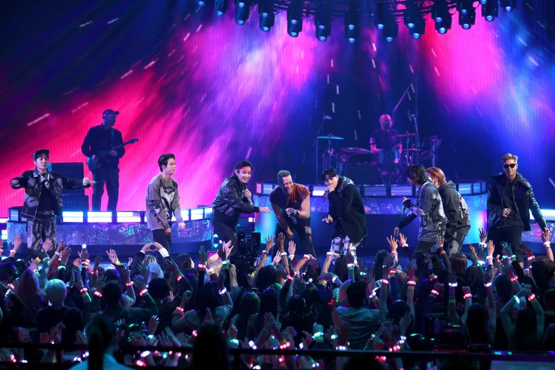 Chris Martin performing with BTS at AMAs.