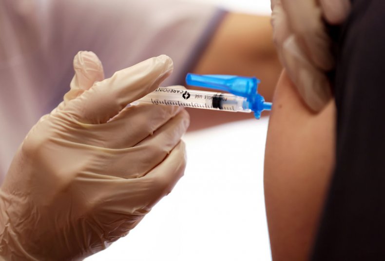 COVID vaccine being given