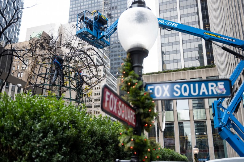Workers disassembling the Fox News Christmas tree.