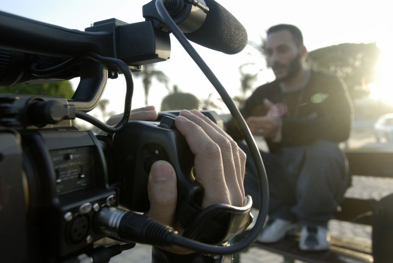 Man in front of camera