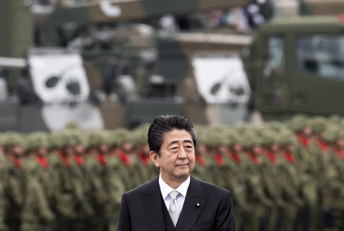 Japan's Shinzo Abe Backs Under-Pressure Taiwan