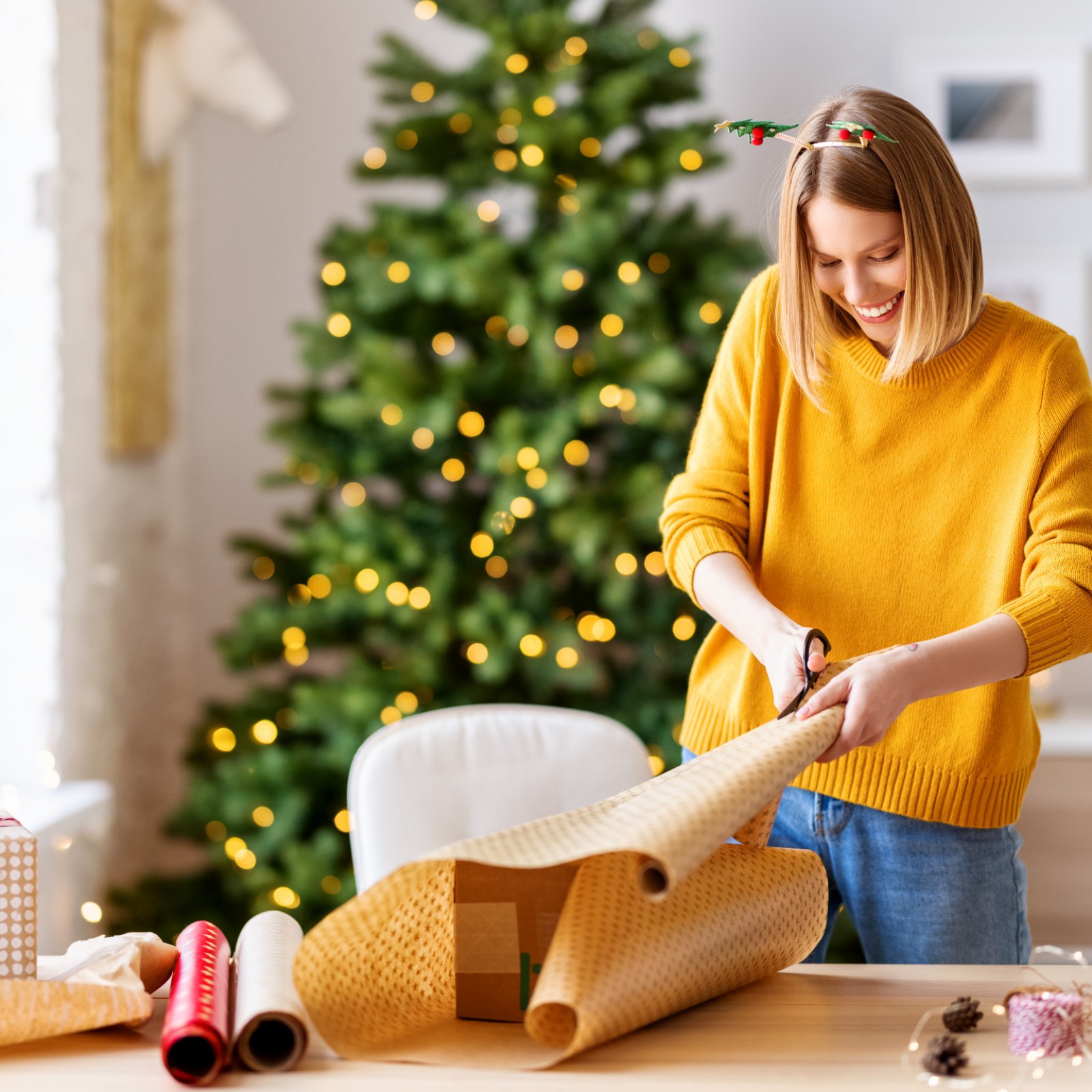 woman wrapping presents