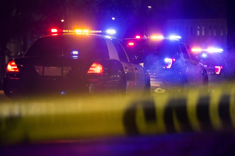 Police cars at a crime scene.