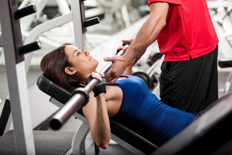 Woman bench pressing