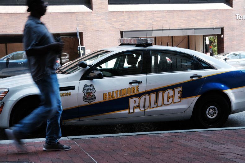 Police Officer in Critical Condition After Ambush, Shot
While Sitting in Patrol Car 2 Baltimore PD Car