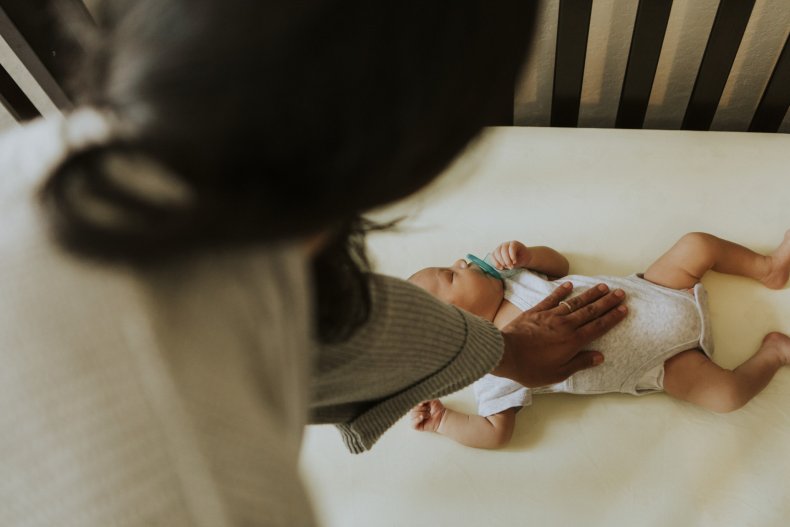Baby in crib