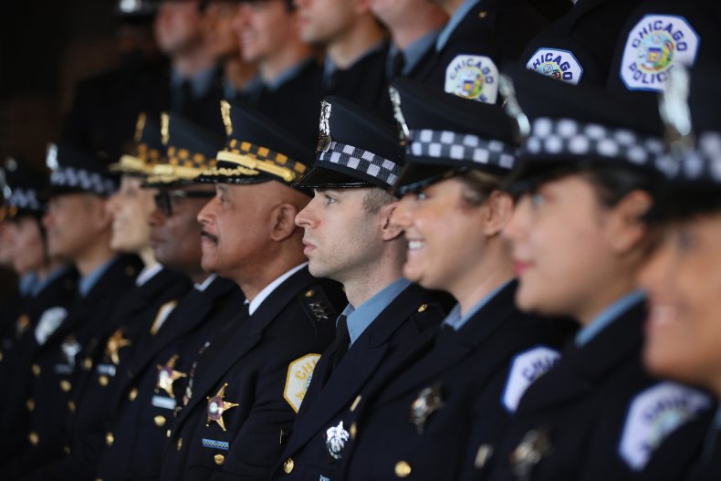 Chicago police officers pose for pictures at 